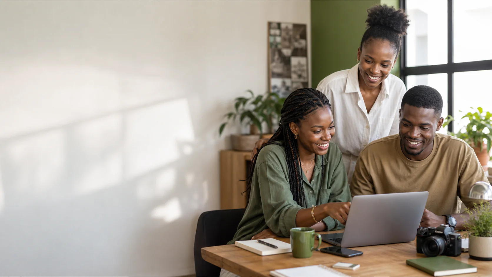 A Ghanaian communications team preparing a SendIt company story